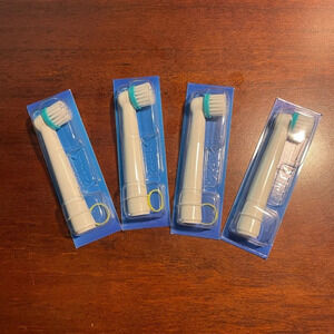 Lot of 4 Oral-B Replacement Electric Toothbrush Heads NWT